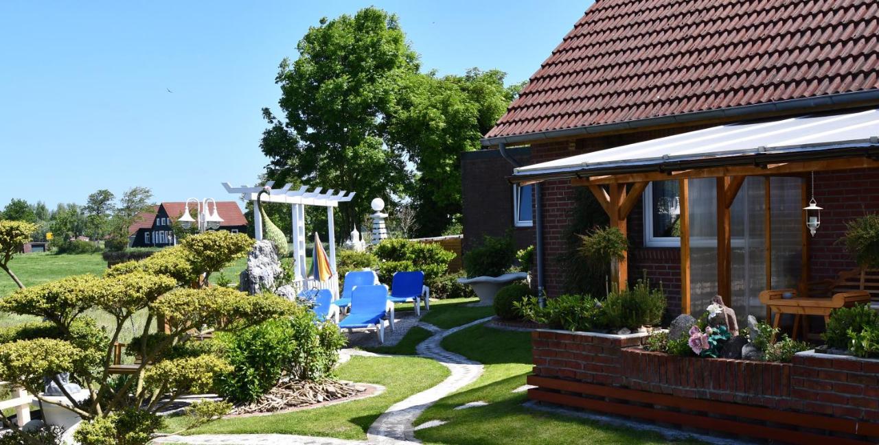 Garni Hotel-Pension Holum Neuharlingersiel Extérieur photo