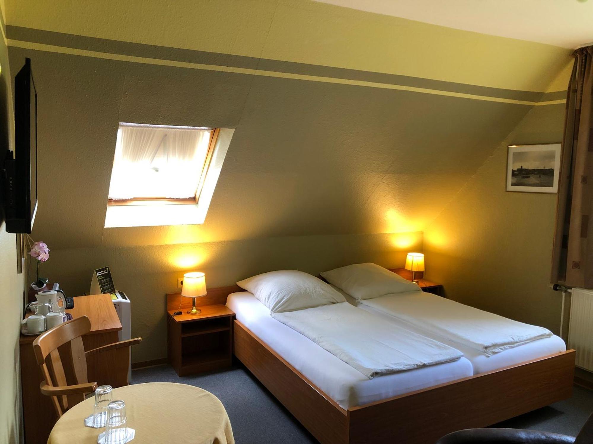 Garni Hotel-Pension Holum Neuharlingersiel Extérieur photo