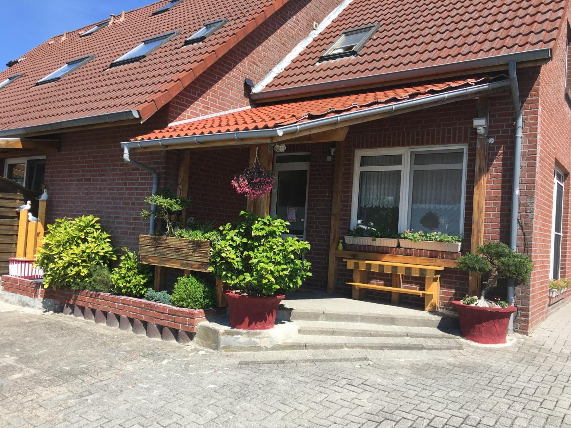 Garni Hotel-Pension Holum Neuharlingersiel Extérieur photo