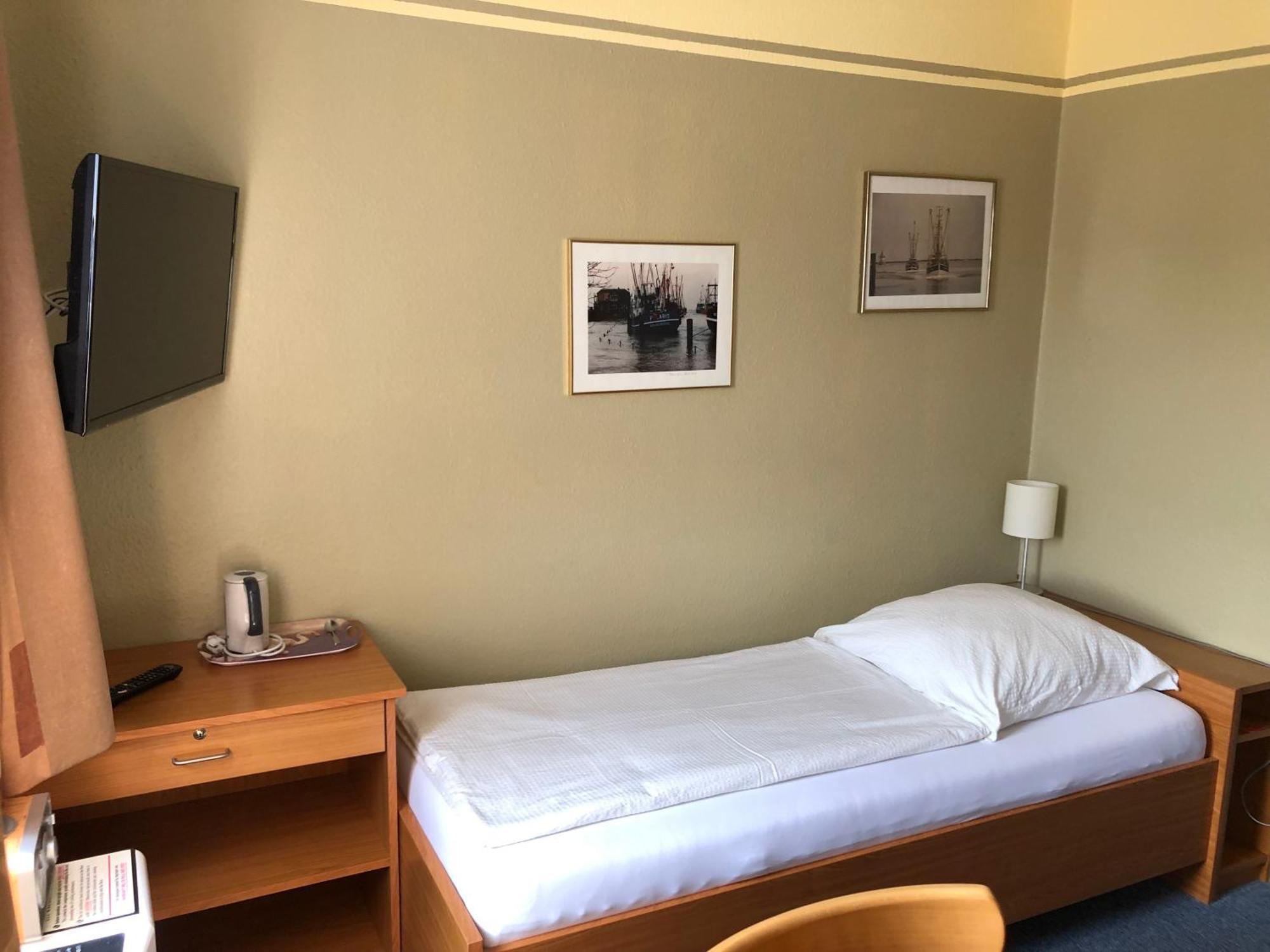 Garni Hotel-Pension Holum Neuharlingersiel Extérieur photo